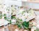 White and greenery wedding garland on table