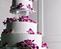 Simple wedding cakes can be as plain as you like... then order loose orchids from Florida and Carolina Garlands & and begin to decorate your cake, simply beautiful! Loose orchids come in a variety of colors. Order now in our online store.
