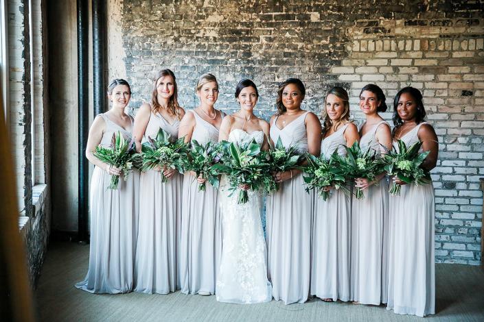 A gorgeous green wedding!! This bride choose the greenery pre-made bouquets and added a couple of other leaves and a couple flowers to here bridal bouquet and the bridesmaids bouquets to give just a little pop of apple green. Choose from our bouquets and bunches category to achieve the look of this wedding. Tampa Florida Weddings with Florida and Carolina Garlands & Pink Pelican Weddings shop now. Wedding photography in Tampa Fl. KK Photography